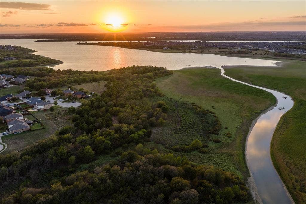 3014 Aurora Mist Drive, Little Elm, TX 75068 Enjoy evening sunsets views while sitting out front Peaceful living in the heart of the booming northern DFW Metroplex.