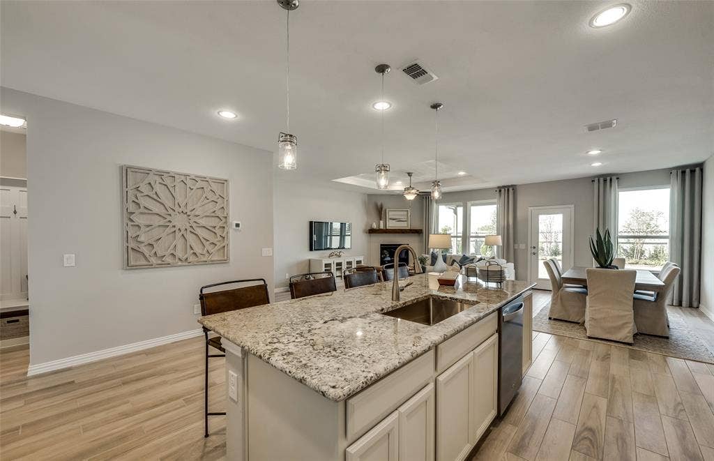 1412 Kadynce Lane, Anna, TX 75409 *Model Representation - Large island gathering room and dining areas overlooking