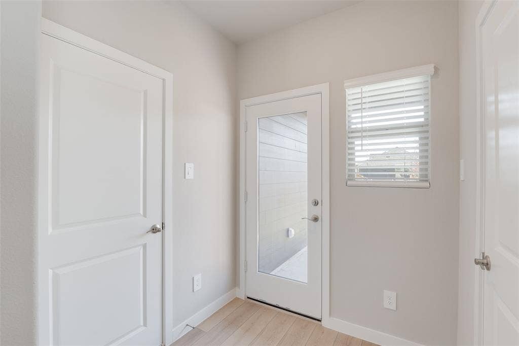 3277 Mint Springs Street, Fort Worth, TX 76179 Garage door and backdoor to covered patio