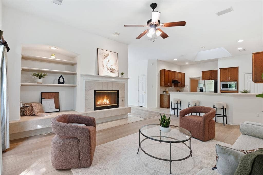 2902 Glen Hollow Court, McKinney, TX 75072 Living area built ins are ideal for important keepsakes and family memories.