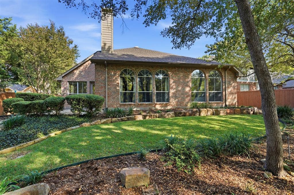 2902 Glen Hollow Court, McKinney, TX 75072 Beautifully landscaped backyard with mature trees