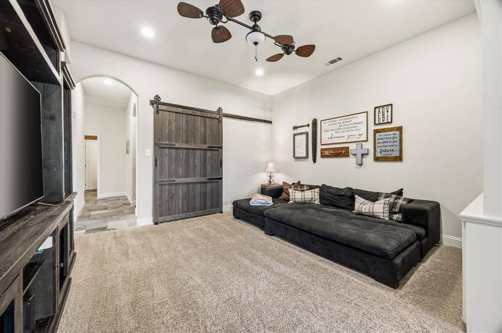232 Branding Iron Court, Royse City, TX 75189 This living area is conveniently located near split bedrooms - perfect for guest!
