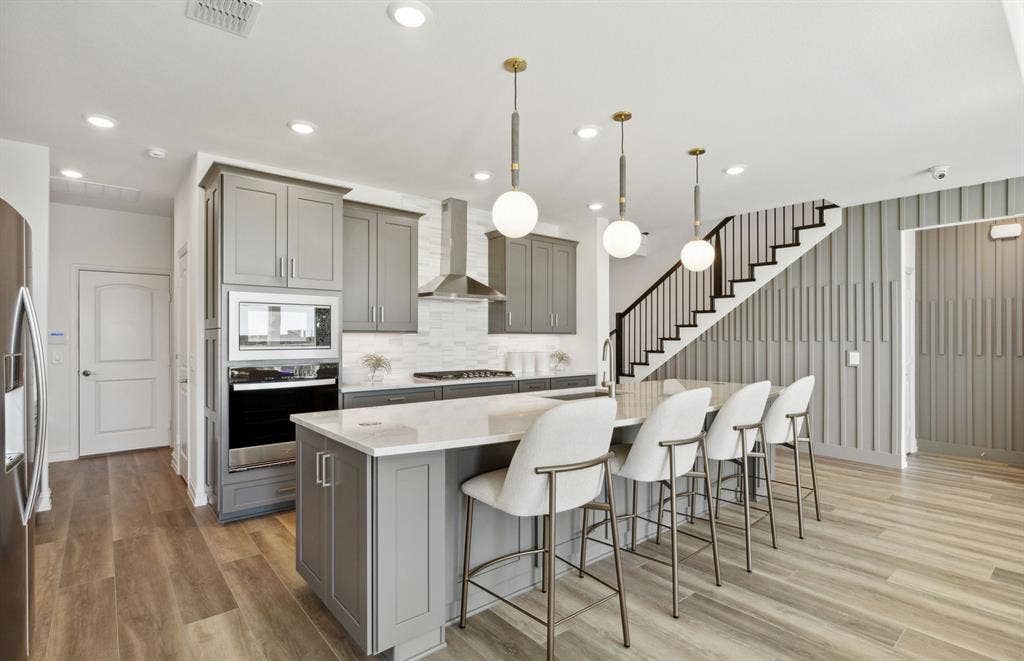 1500 Xavier Street, Anna, TX 75409 *Model Representation - Spacious kitchen with eat-in bartop island