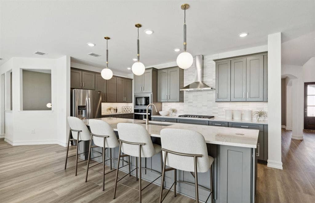 1500 Xavier Street, Anna, TX 75409 *Model Representation - Abundant cabinet space in kitchen