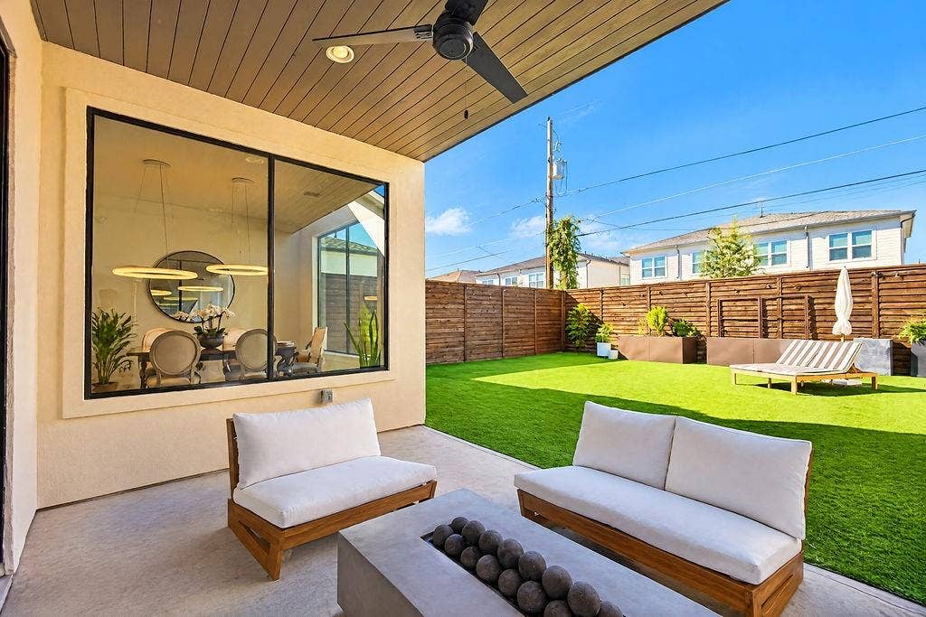 4515 Cowan Avenue, Dallas, TX 75209 Host outdoor dinners or relax in the shade while keeping an eye on backyard activities