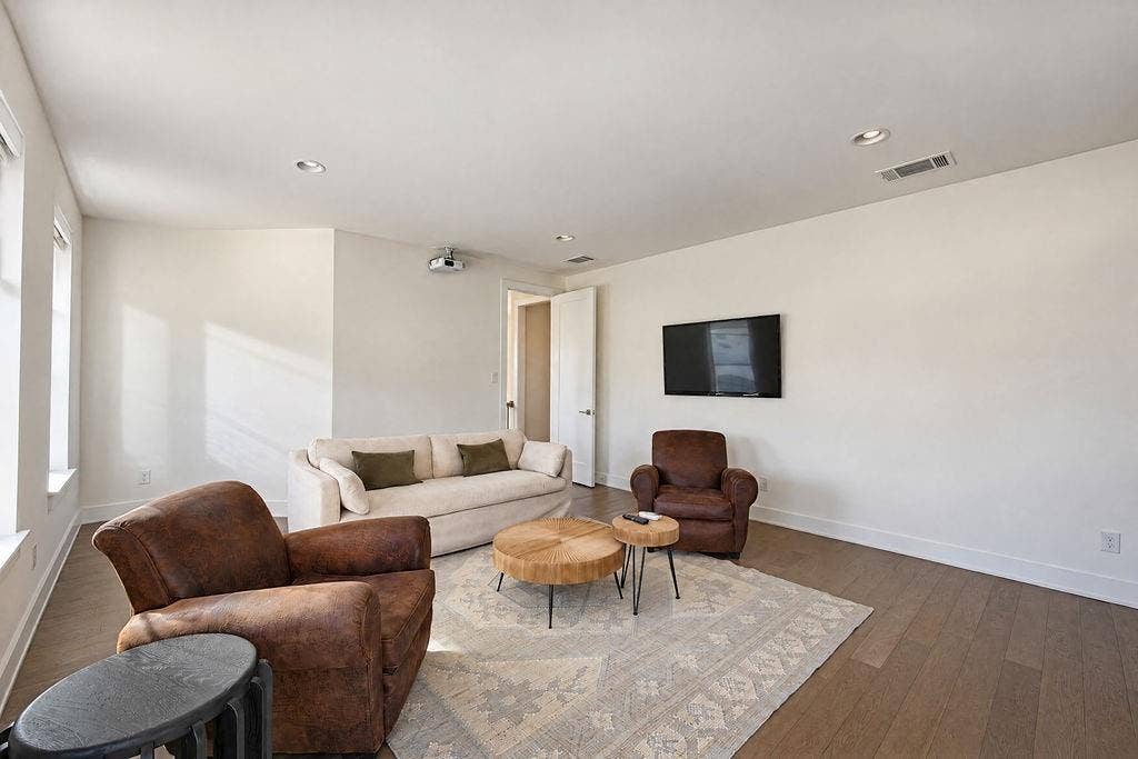 4515 Cowan Avenue, Dallas, TX 75209 A dedicated game room equipped with a projector creates the ultimate home theater for sports, gaming, or movie marathons