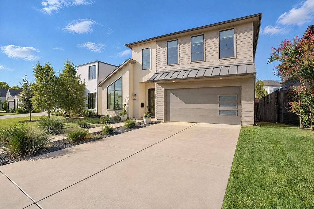 4515 Cowan Avenue, Dallas, TX 75209 A driveway and two-car garage offer easy parking for guests