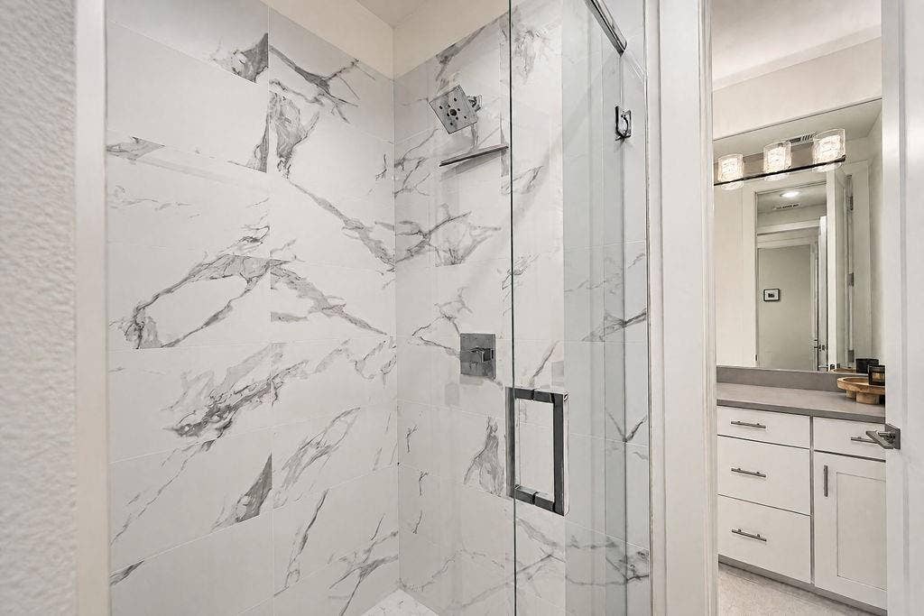 4515 Cowan Avenue, Dallas, TX 75209 The two rooms share a water room with a walk-in shower