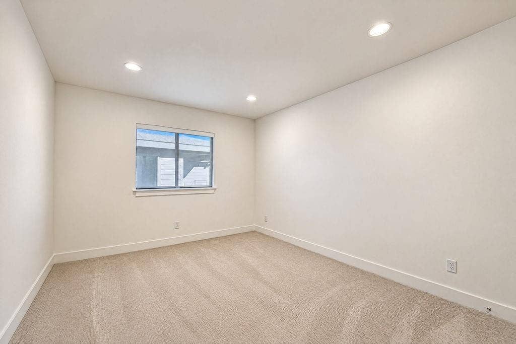 4515 Cowan Avenue, Dallas, TX 75209 Sunlight fills this spacious upstairs guest room, creating an inviting space where family or visitors can relax and recharge in comfort