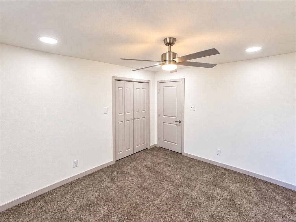 2551 Pinebluff Drive, Dallas, TX 75228 Interior space featuring neutral wall-to-wall carpeting, recessed ceiling lighting, and a multi-blade metal ceiling fan
