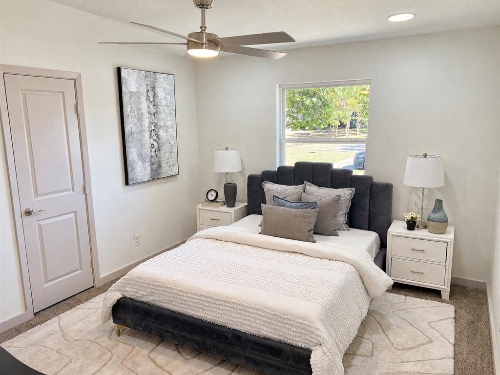 2551 Pinebluff Drive, Dallas, TX 75228 Neutral interior featuring carpeted flooring, a ceiling fan with integrated lighting, recessed lighting, and a multi-pane window