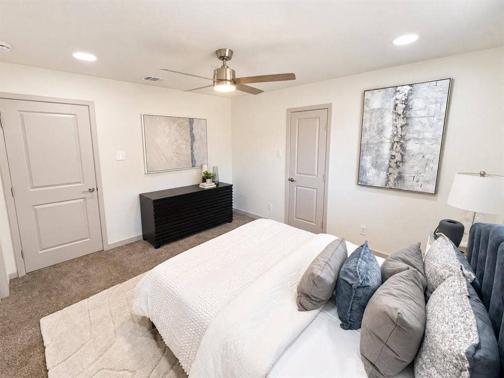 2551 Pinebluff Drive, Dallas, TX 75228 Neutral-toned wall-to-wall carpeting, recessed LED lighting, brushed metal ceiling fan, and multi-panel interior doors