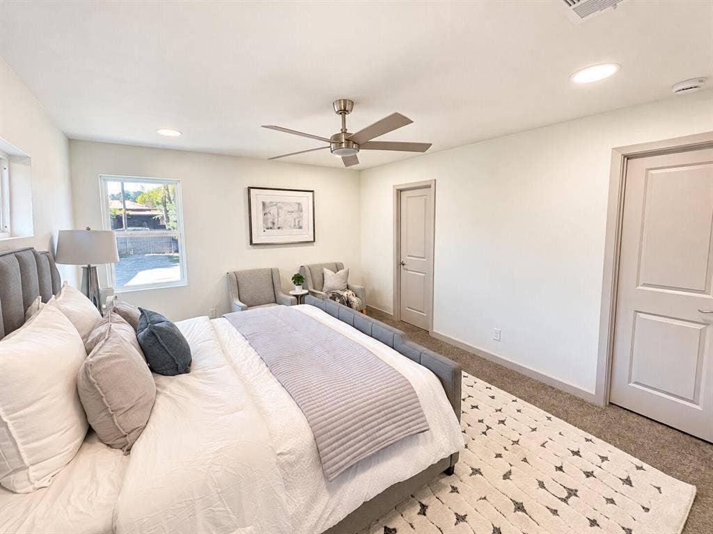 2551 Pinebluff Drive, Dallas, TX 75228 Neutral-toned bedroom featuring recessed lighting, a brushed-nickel ceiling fan, carpeted flooring, and two-panel interior doors