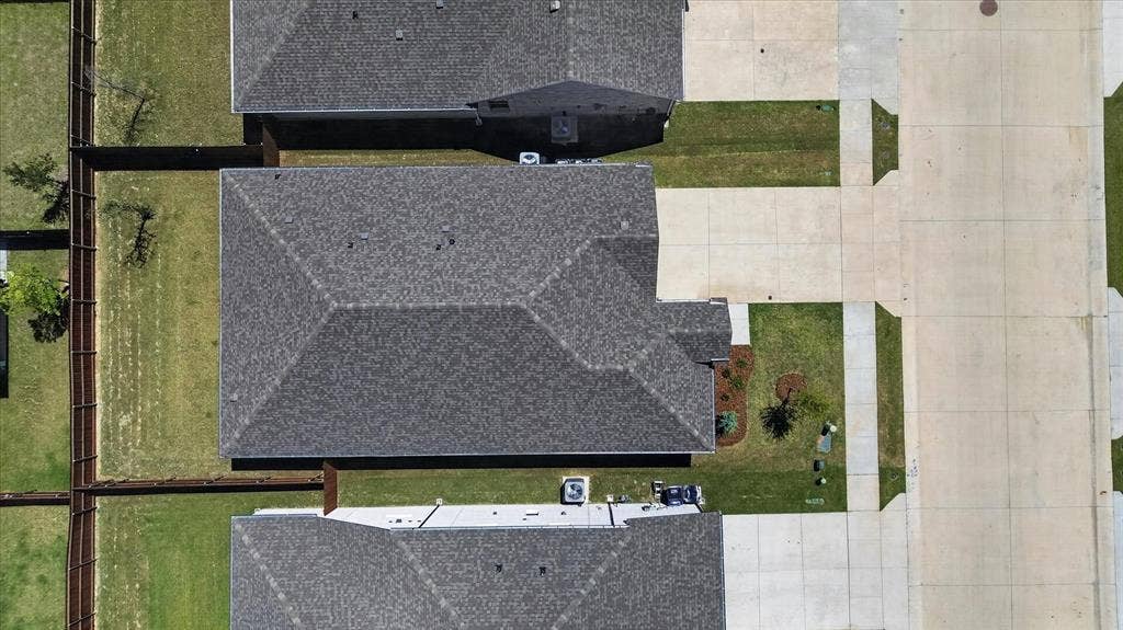 903 Edgehurst Drive, Princeton, TX 75071 Aerial view showcasing a residential property with a gray asphalt shingle roof