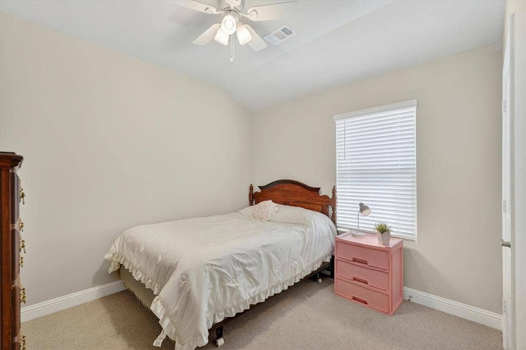 903 Edgehurst Drive, Princeton, TX 75071 Carpeted interior room featuring light neutral wall tones and white baseboards