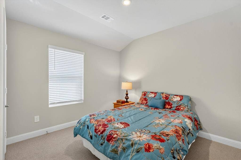 903 Edgehurst Drive, Princeton, TX 75071 Carpeted room with light neutral walls, white trim, and a single window featuring horizontal blinds