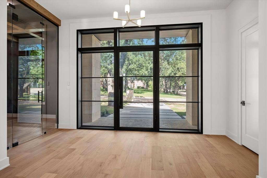 Open Entryway with beautiful glass door and windows