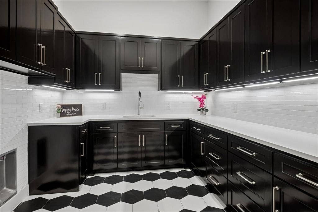 Spacious Laundry Room with Sink and Tons of Storage