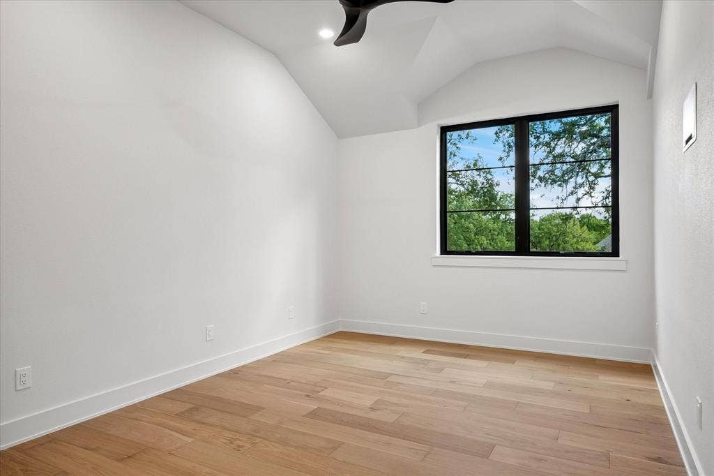 Bedroom with High Ceiling & a Walk-In Closet