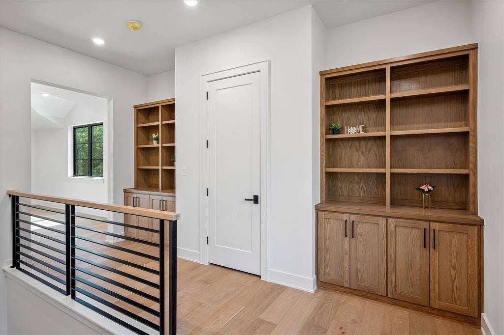 Bookshelves and Large Storage Closet on Upper Level