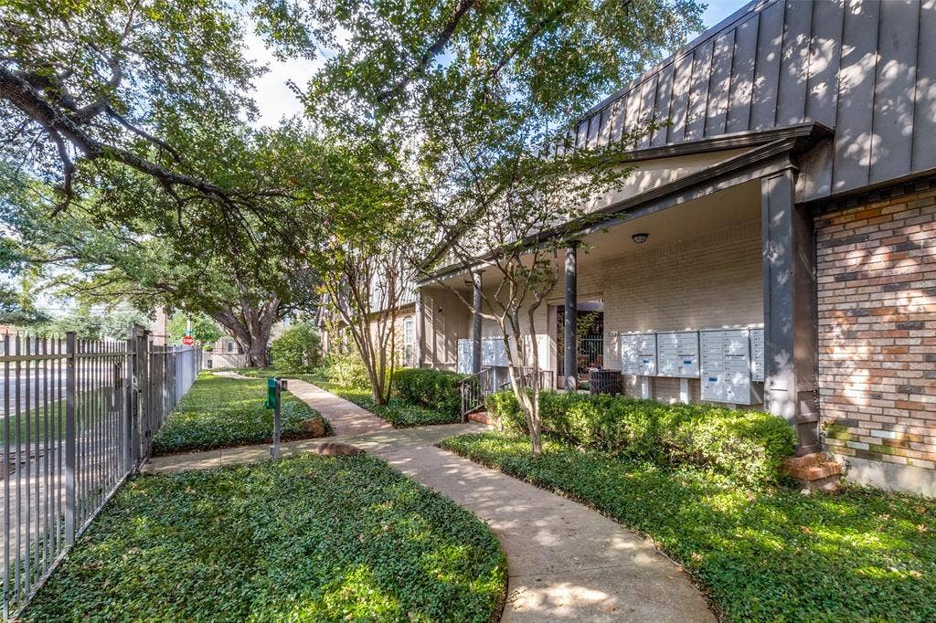 Community guest entry gate and walkway to condo