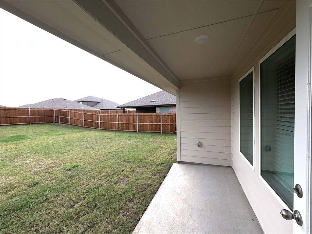 4017 Bronco Drive, Princeton, TX 75407 Covered concrete patio with recessed lighting, horizontal lap siding, and fenced backyard
