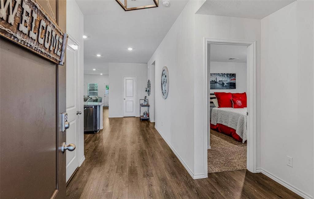 118 Secretariat Lane, Caddo Mills, TX 75135 Hallway with dark wood-type flooring