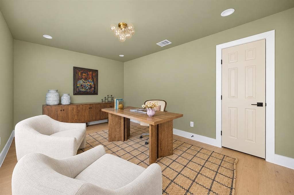 With views of the neighborhood, it's the perfect setting for work from home productivity.  (This photo has been digitally enhanced.)