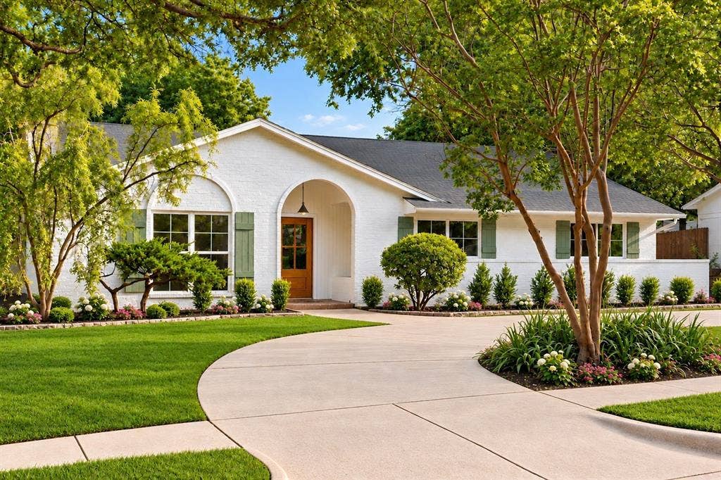With attention to every detail, 401  showcases timeless curb appeal, thoughtful architectural details, and a welcoming first impression.(This photo has been digitally enhanced.)