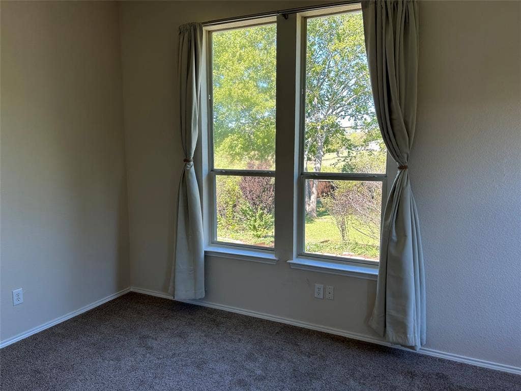 302 Harvard Drive, Princeton, TX 75407 View from master bedroom to backyard
