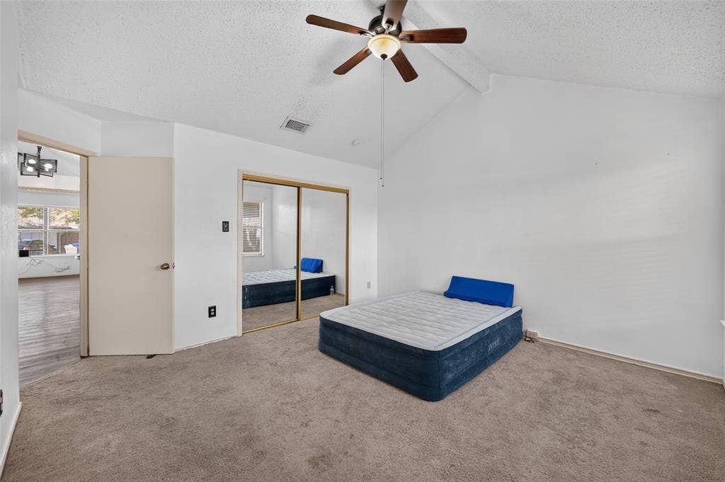 583 Kirkland Drive, Coppell, TX 75019 Vaulted ceiling with an attached ceiling fan