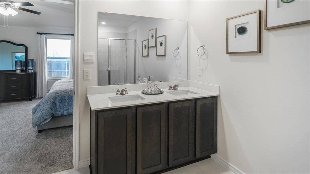 406 Campfield Drive, Caddo Mills, TX 75135 Dual vanity with rectangular undermount sinks and a light-toned countertop