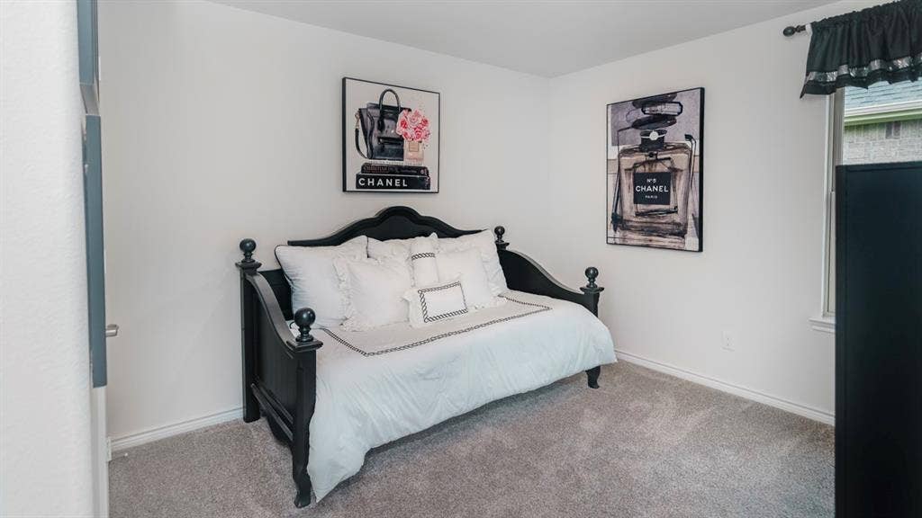 406 Campfield Drive, Caddo Mills, TX 75135 Carpeted room with a window featuring white trim
