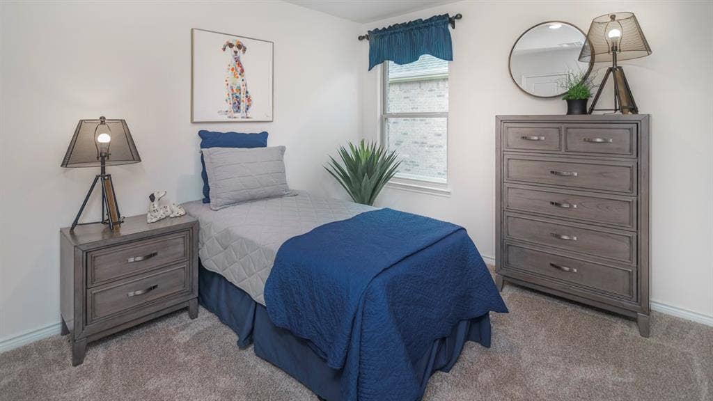 406 Campfield Drive, Caddo Mills, TX 75135 Carpeted interior space featuring a window with a valance, light-toned walls, and a visible window frame