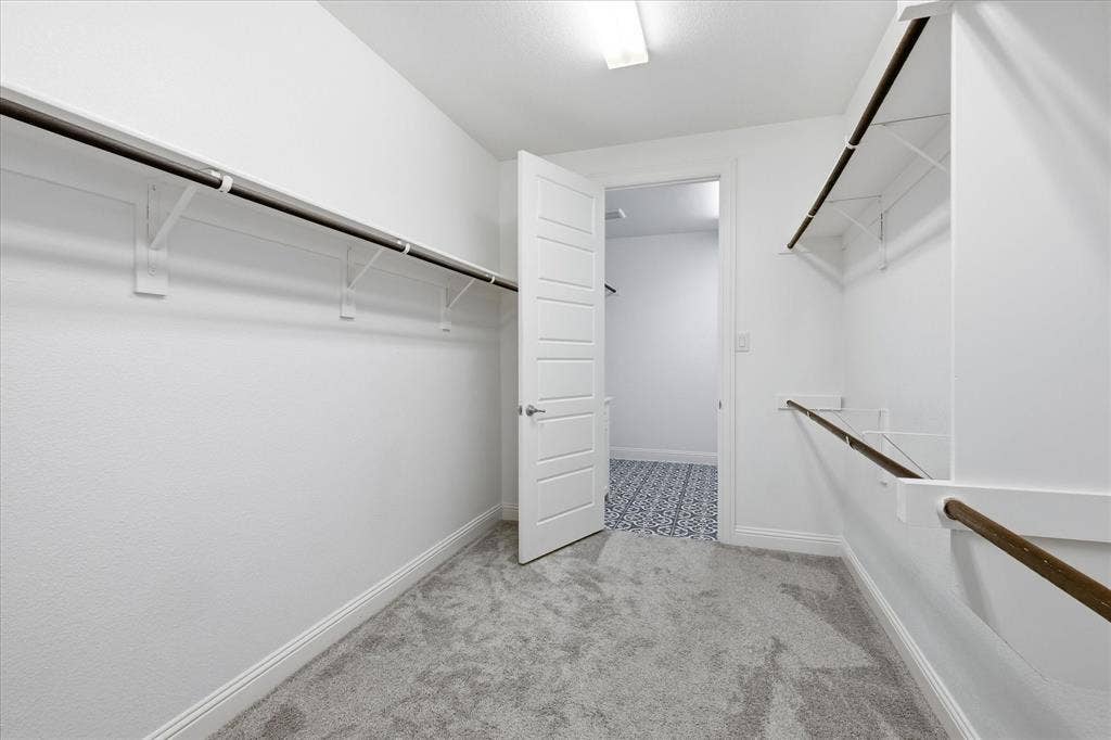 Walk-in closet connects to laundry! how convenient!