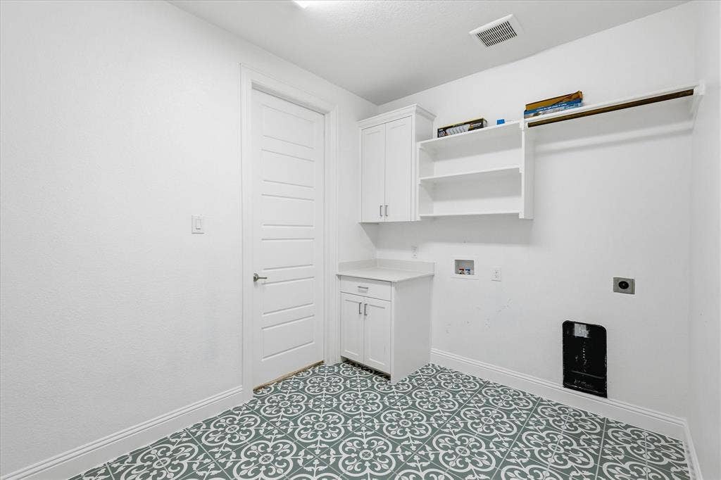 Dedicated laundry connects to primary closet!
