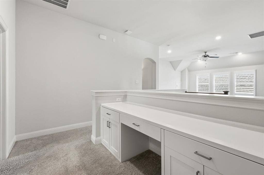 Built in desk adjacent to secondary bedrooms.
