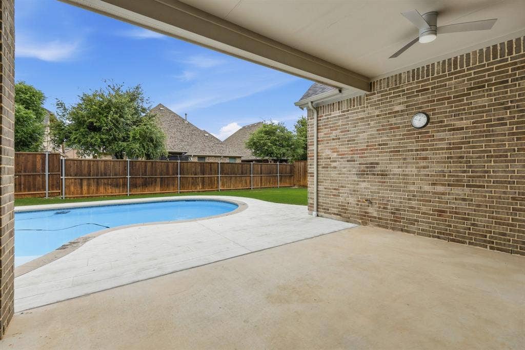 Covered outdoor patio is your white canvas! Kitchen, living area, whatever you want!