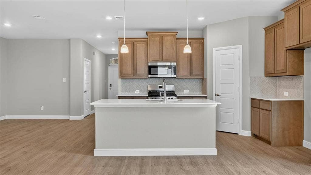 Kitchen- All Home and community information, including pricing, included features, terms, availability and amenities, are subject to change at any time without notice or obligation. All Drawings, pictures, photographs, video, square footages, floor plans, elevations, features, colors and sizes are approximate for illustration purposes only and will vary from the homes as built.