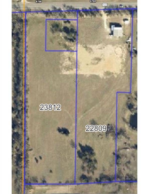 Aerial overview of property's location featuring property boundaries highlighted.