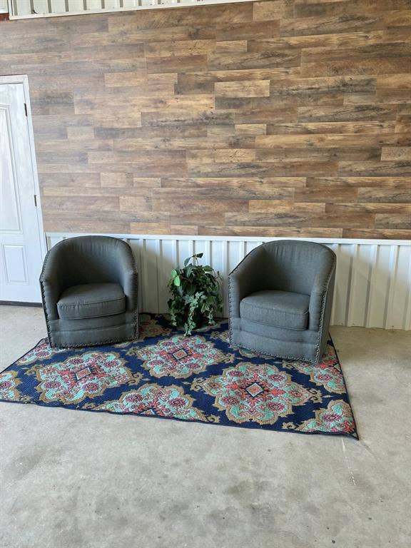 Living area featuring concrete floors