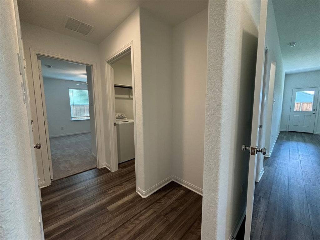 Hallway serving bed 3 and laundry room