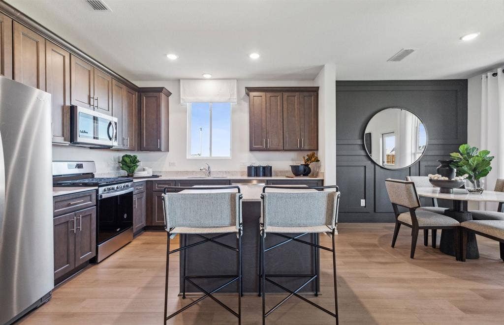 14105 Olney Drive, Pilot Point, TX 76258 *Model Representation - Spacious kitchen with eat-in bartop island