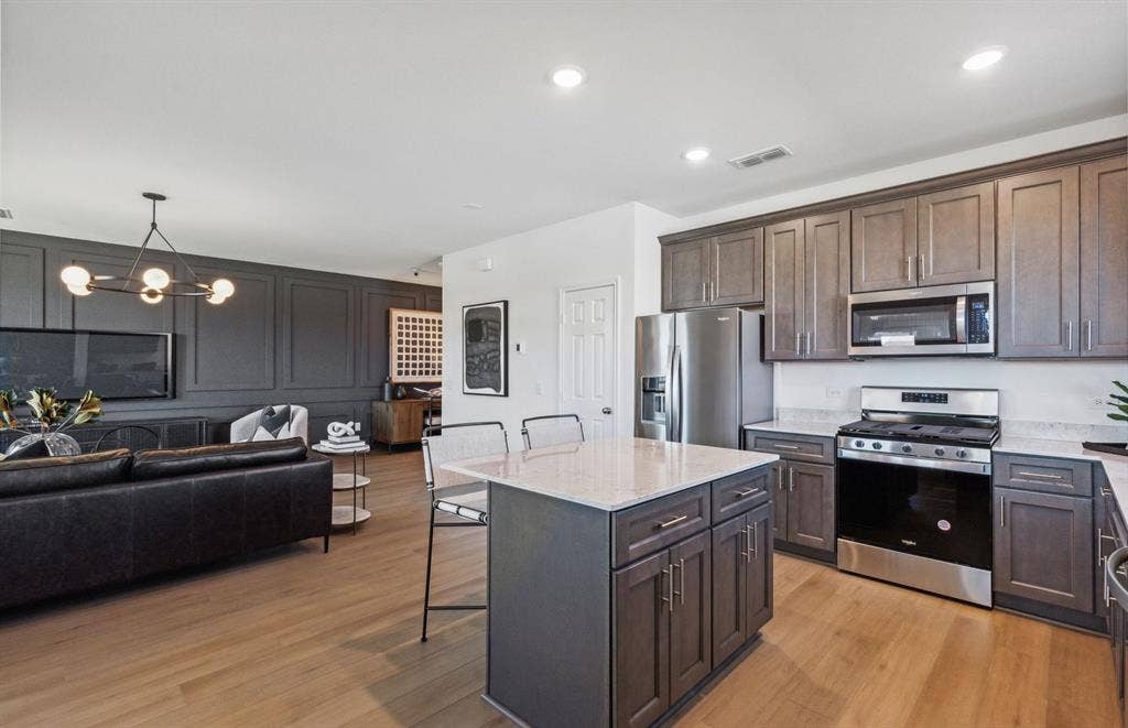 14105 Olney Drive, Pilot Point, TX 76258 *Model Representation - Large island gathering room and dining areas overlooking