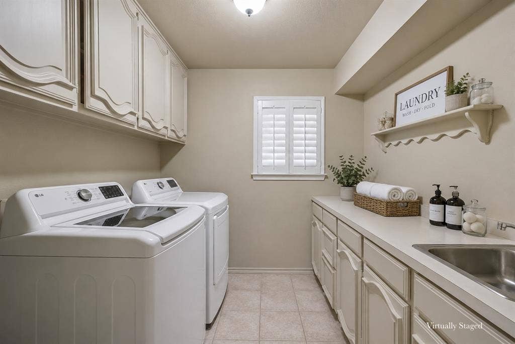 4008 Fairlakes Drive, Dallas, TX 75228 Utility room with ample cabinetry, a built-in countertop, and an integrated stainless steel sink