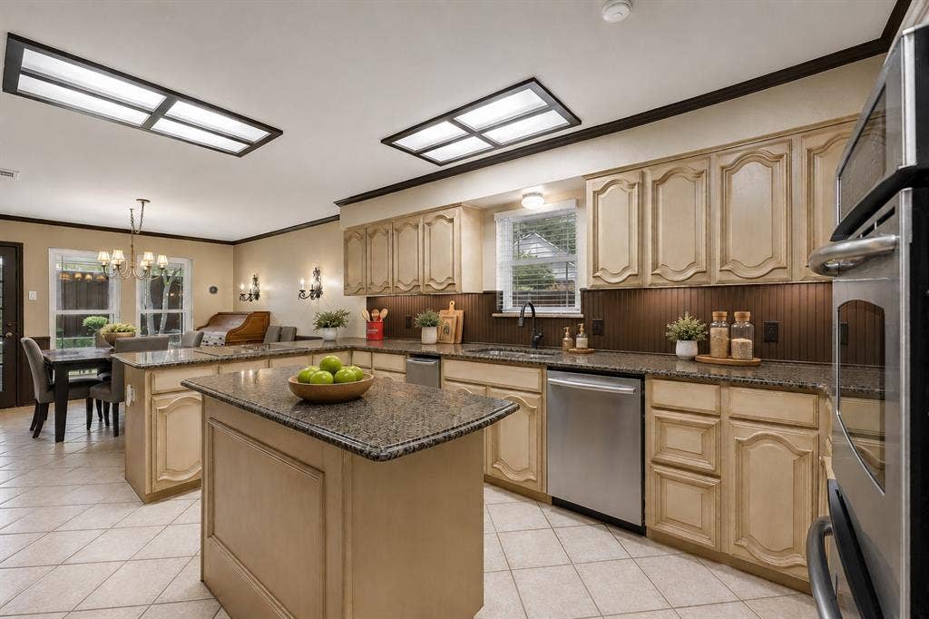 4008 Fairlakes Drive, Dallas, TX 75228 Kitchen featuring dual islands with stone countertops, a stainless steel dishwasher, and built-in wall oven