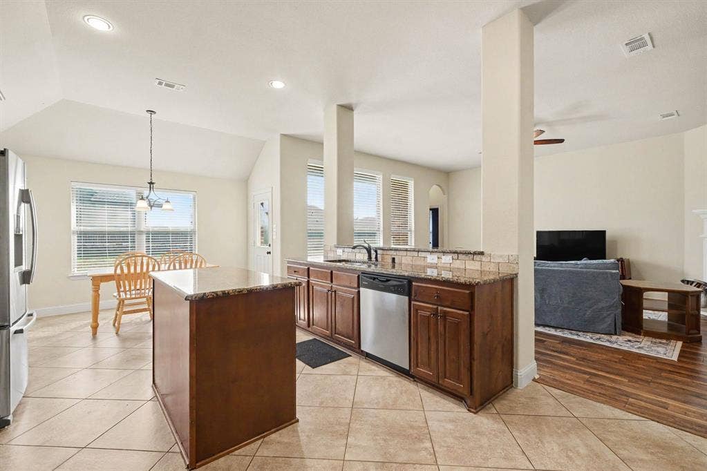 1005 Seminole Lane, Greenville, TX 75402 An open kitchen designed for easy connection.