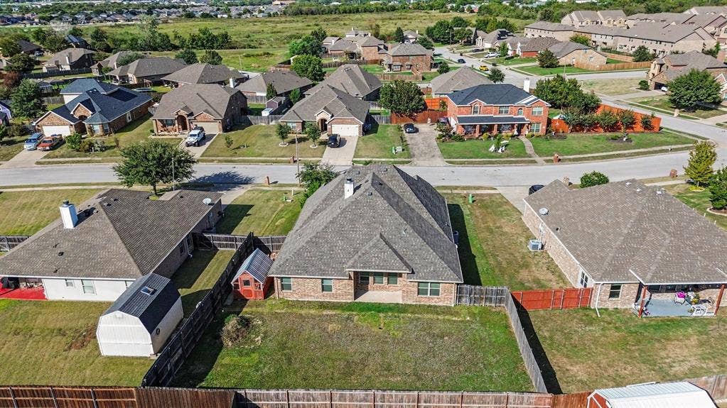 1005 Seminole Lane, Greenville, TX 75402 An aerial perspective of the home and neighborhood.