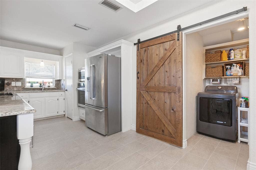 1724 Callaway Drive, Plano, TX 75075 Easy to access laundry room, no need to walk through it to get to the garage!