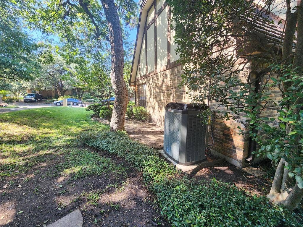 6510 Covecreek Place, Dallas, TX 75240 The downstairs AC unit is on the other side of the house.